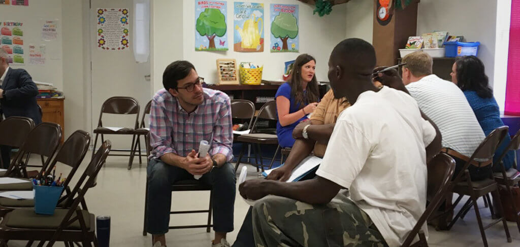 Group of people discussing Are You a Good Neighbor?