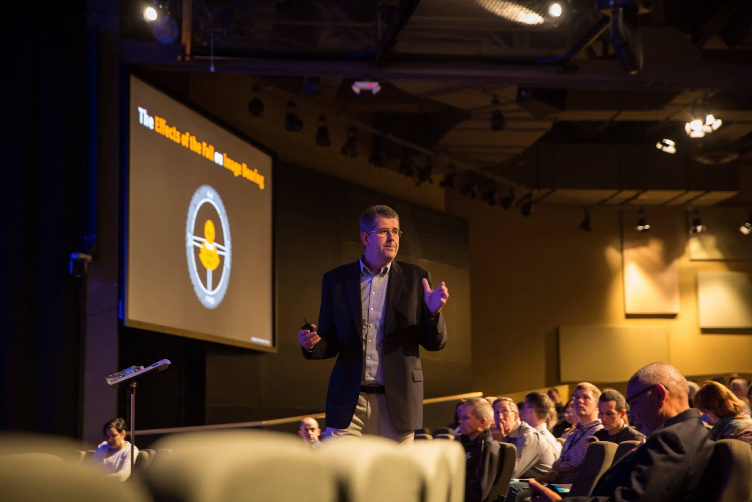 Brian lecturing a group of people